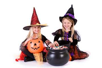 Halloween: Little Girls Ready To Grab Halloween Candy