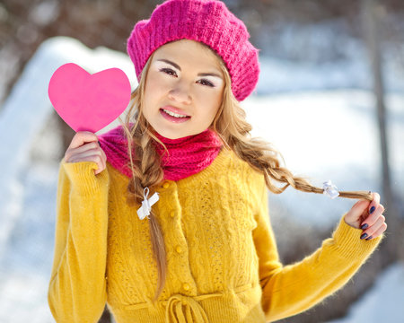 beautiful woman in a pink winter hat