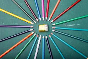 Pencils around sharpener