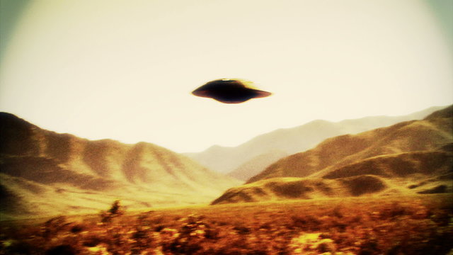 UFO 002: Retro footage of a UFO flying saucer in the desert.