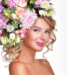 Beautiful woman with flowers in her hair. Bouquet of Beautiful F