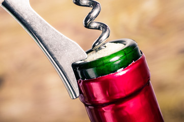 Opening a wine bottle corkscrew