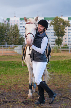 Horsewoman and horse