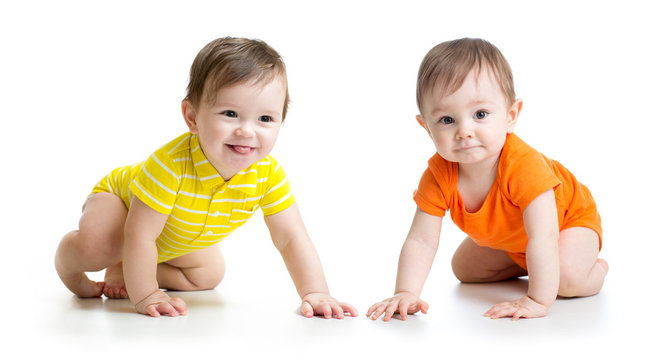 cute crawling babies boys isolated on white background