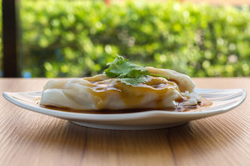 spring rolls with sweet sauce, vegetables and in noodle tube