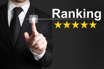 businessman pushing button ranking five rating stars