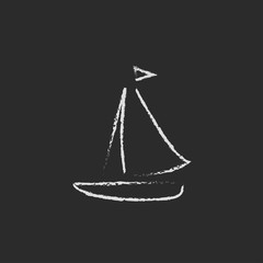 Sailboat icon drawn in chalk.