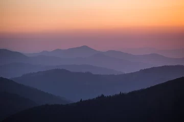 Foto op Canvas Kleuren bij zonsondergang in de bergen © varenyk
