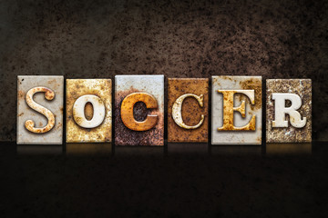 Fototapeta na wymiar Soccer Letterpress Concept on Dark Background