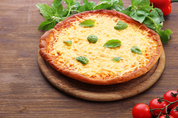 Cheese pizza with vegetables on table close up
