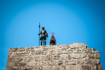 Knight with armour on a wall in the Old Rhodes Town in Greece