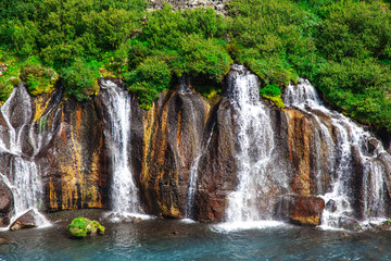 Iceland, Hraunfossar waterfalls in a beautiful sunny summer day