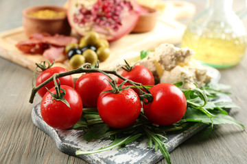 Ingredients of Mediterranean cuisine, on wooden board background