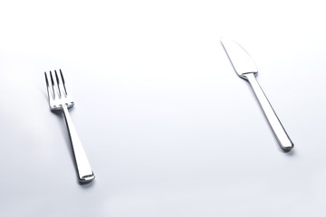 Fork and knife on white background