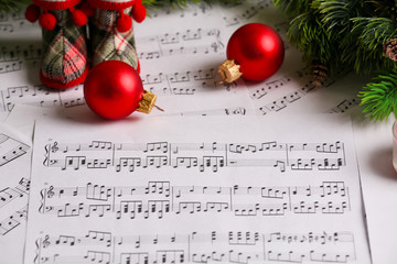 Music notes with Christmas decoration close up