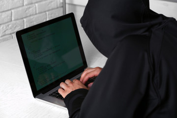 Hacker with laptop