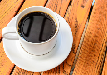 Coffee cup on wood table, coffee break