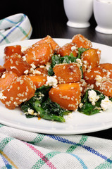 pumpkin with spinach and sesame seeds