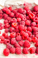 fresh red raspberries in a wooden box,.raw healthy food