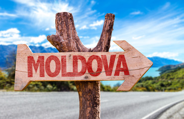 Moldova wooden sign with road background
