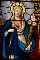 Fototapeta na wymiar Virgin Mary church stained-glass windows