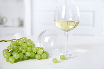 Still life of wine and bread on light background