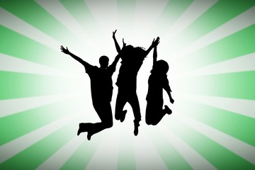 Composite image of silhouette of people jumping