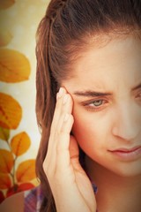 Fototapeta premium Composite image of close-up of beautiful woman suffering