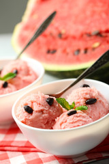 Watermelon ice cream in bowl, close-up