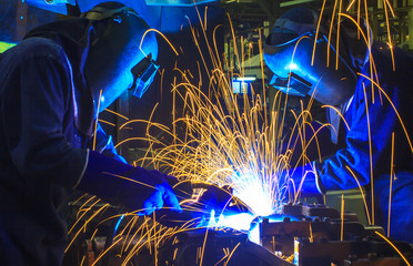 welder Industrial  automotive part in factory

