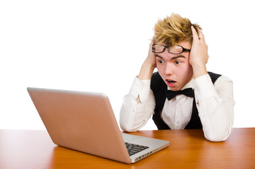 Smart student sitting with laptop isolated on white