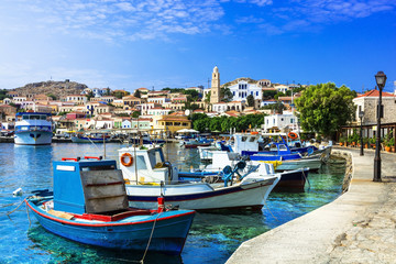 Fototapeta na wymiar traditional island of Greece - Chalki . with old fishing boats