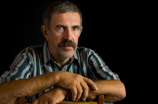 Portrait of Ukrainian peasant in low key
