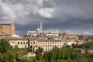 Obraz premium Sienna (Siena) Cathedral Cattedrale di Santa Maria Assunta with old town, Tuscany, Italy