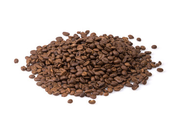 Roasted coffee beans spilled on a white background.
