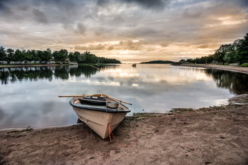 Fototapeta na wymiar Rowing boat in Poroholma beach