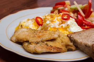 delicious and nourishing dinner. Vegetable salad, fish and eggs
