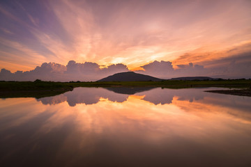 Fototapeta na wymiar Beautiful scenery sunset sky view of lake and reflection in wate