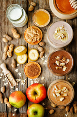 list peanut butter smoothie with chocolate, apples, banana and oats. the toning. selective focus