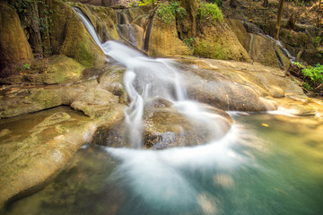 Beautiful flowing waterfall on the rock