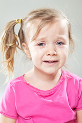 Little girl with tooth pain  