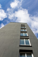 Obraz premium gray building, blue sky