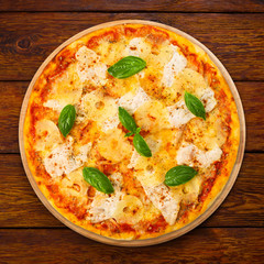 Delicious pizza with pineapple and chicken