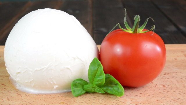 tomato and basil rotating on white background
