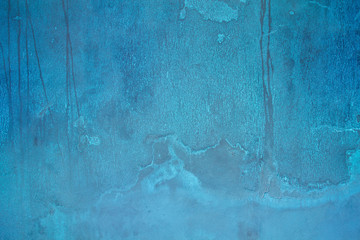 Grain blue paint wall background or texture