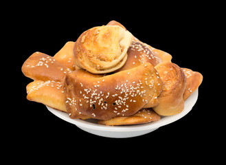 biscuits in a plate on a black background