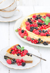 Cheesecake with summer berries and mint