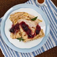 Blintzes or Pancakes with Blueberries. Selective focus.
