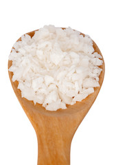 Salt on wooden spoon isolated on white background