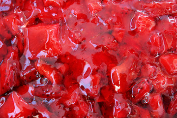 Filling fresh glazed strawberry cake